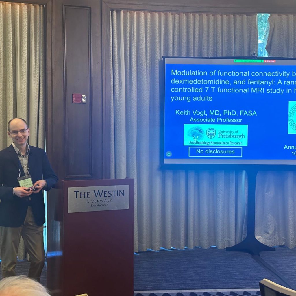 Dr. Keith Vogt at the podium at ISAP 2025